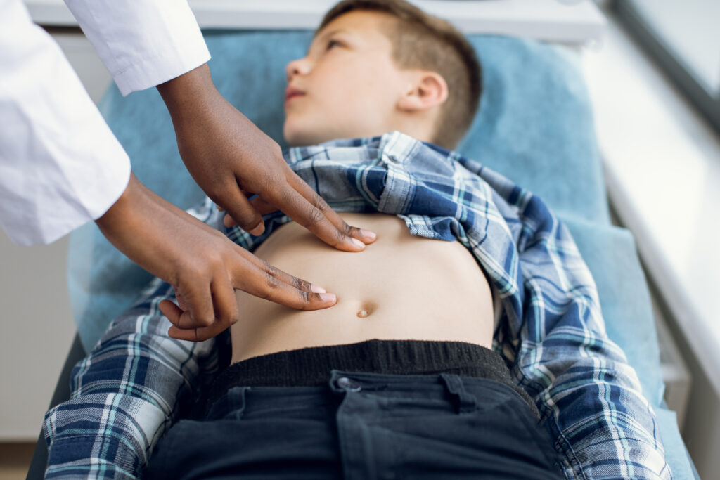Child getting a physical examination by a doctor