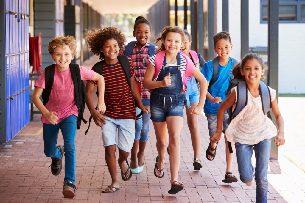 A group of kids running to school