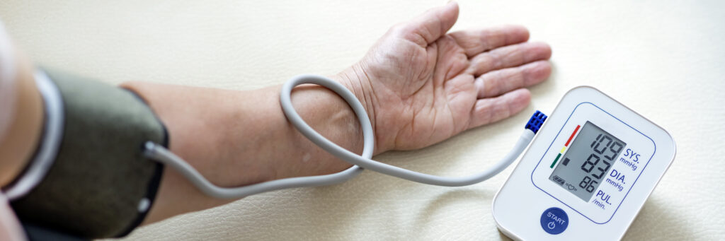 A man uses an at-home blood pressure test